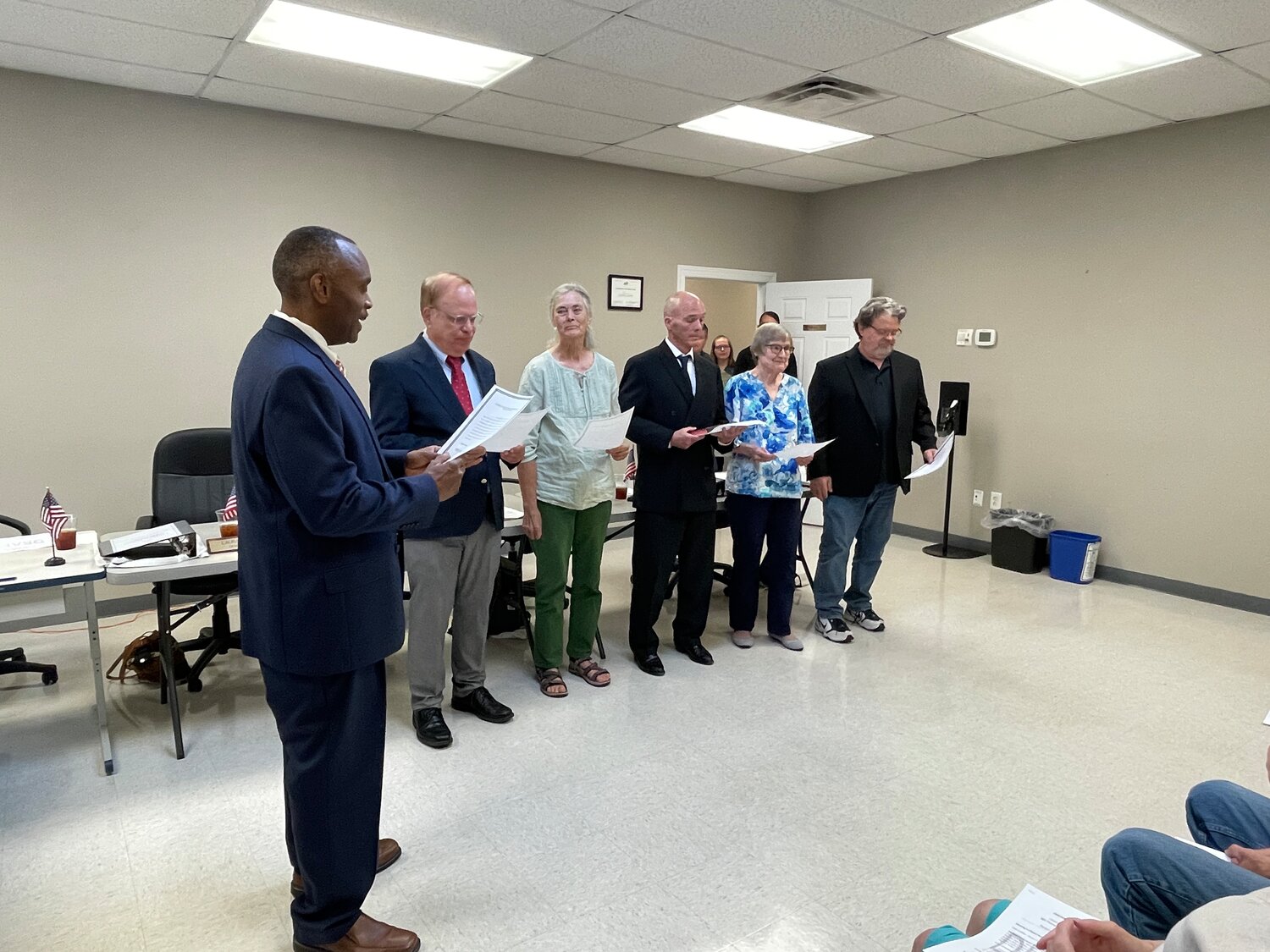 From left to right, N.C. House Rep. Robert Reives II (D-Dist.54) swore in Bob Tyson, Chair Laura Heise, Secretary Frank Dunphy, Erika Lindemann and Mark Barroso to the Chatham County Board of Elections at noon on Tuesday, July 18.